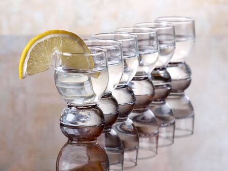 Color photo of a glass cup with tequila       の写真素材