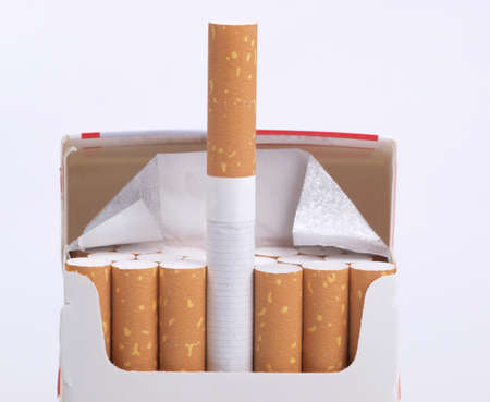a cardboard packet and filter cigarettes        の写真素材