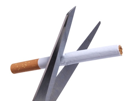 cigarettes and metal scissors      の写真素材