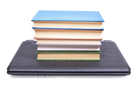 Color photo of an old book and computer      の写真素材