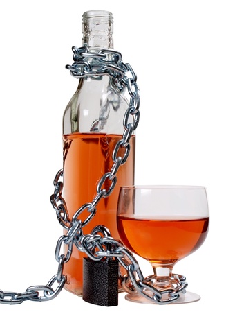 Color photo of bottles of whiskey and metal chain        の写真素材