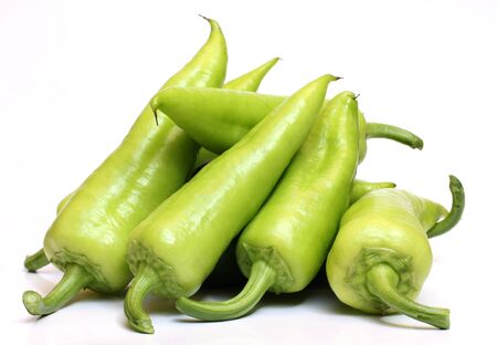 Color photo of a green pepper on a white backgroundの写真素材
