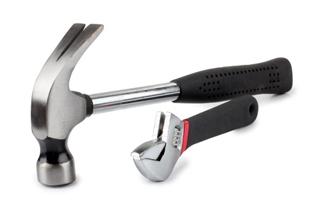 Color photo of a hammer and wrenchの写真素材