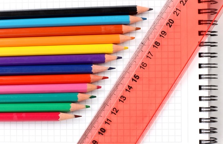 Color photo of a set of pencils on notepadの写真素材