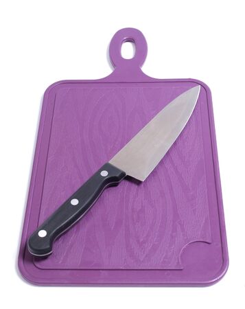Color photograph of kitchen knives on board        の写真素材