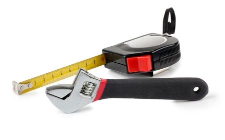 Color photo of a ruler and wrenchの写真素材