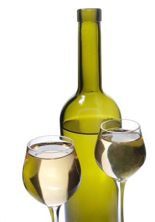 Color photo of a two glass bottles with a white background       の写真素材