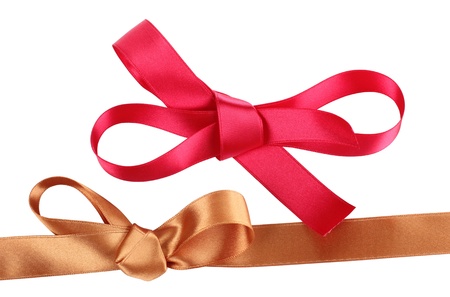 Color photo of a bow on red and gold ribbonの写真素材