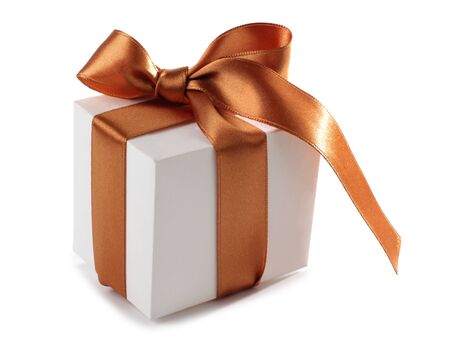 Color photo of a box and gold ribbonの写真素材