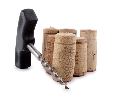Color photo of bottle corks and old corkscrew   の写真素材