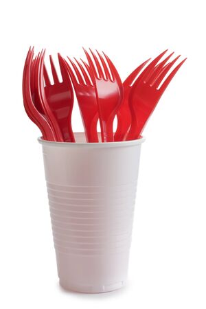 Color photo of a set of red forksの写真素材