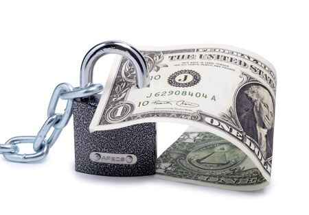 Color photo of a metal padlock and dollar     の写真素材