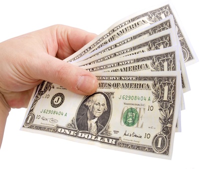 Color photo of dollar in hand        の写真素材
