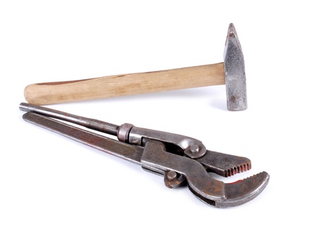 Color photo of a metal wrench and hammer      の写真素材