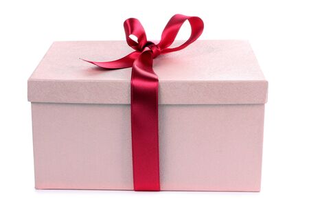 Color photo of a box and red ribbonの写真素材