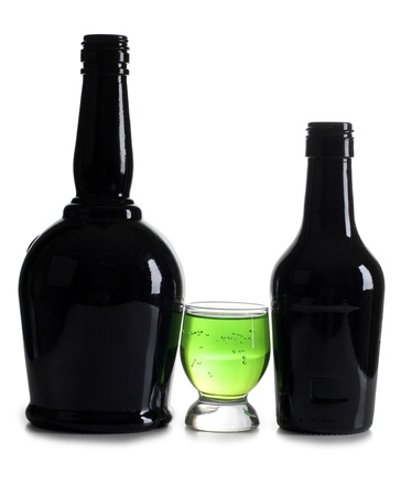 Color photograph of bottle and cocktails in glass beakersの写真素材