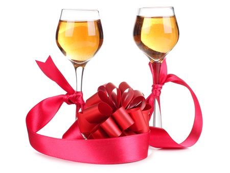 Color photo of wine glasses and a red ribbonの写真素材