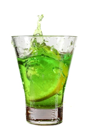 Color photo of a glass cup with a cocktail and lemonの写真素材