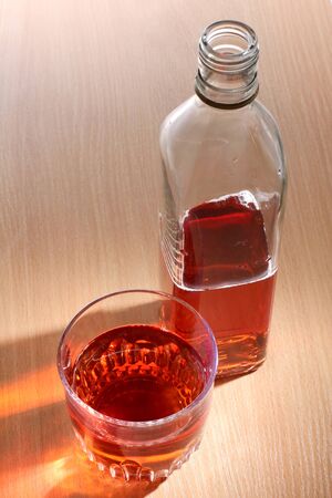 Color photo of a glass bottles of whiskeyの写真素材