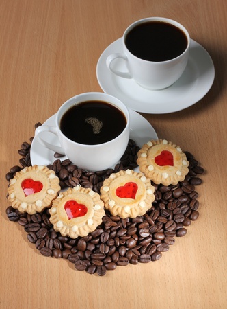 Color photo of coffee beans and a white cupの写真素材