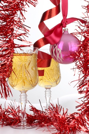 Color photo of Christmas toys and wineglassesの写真素材