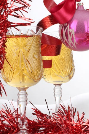 Color photo of Christmas toys and wineglassesの写真素材