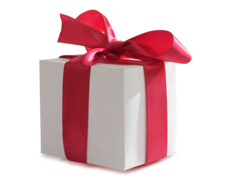 Color photo of a box and red ribbonの写真素材