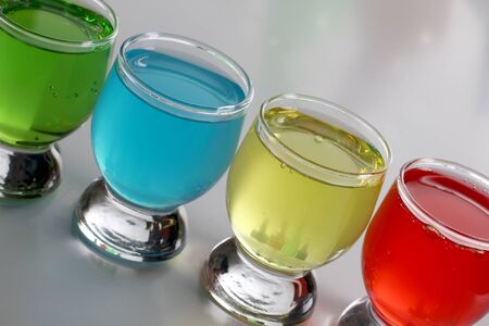 Color photograph of color cocktails in glass beakersの写真素材