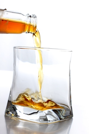 Color photo of a glass of whiskeyの写真素材