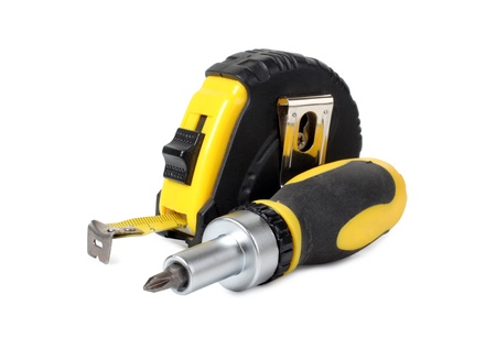 Color photo of a screwdriver and rulerの写真素材