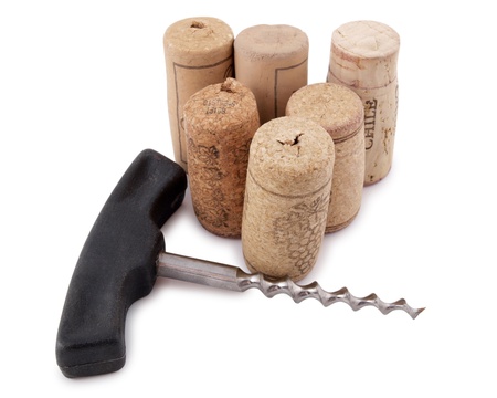 Color photo of bottle corks and old corkscrew    の写真素材