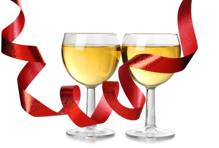 Color photo of wine glasses and a red ribbonの写真素材