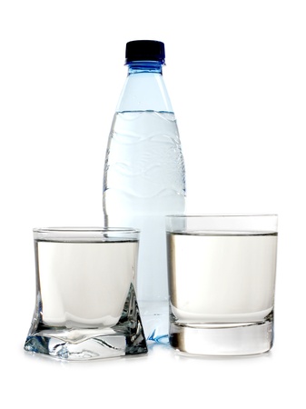 Color photo of glasses and bottles of waterの写真素材