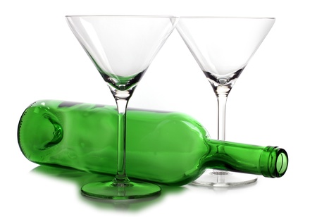 Color photograph of empty glasses of wine and bottleの写真素材