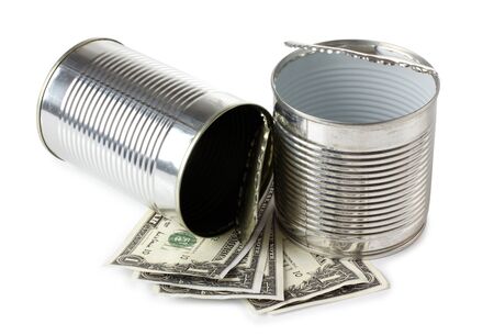 Color photograph of metal cans and paper moneyの写真素材