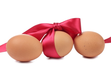 Color photo of eggs and red bowの写真素材