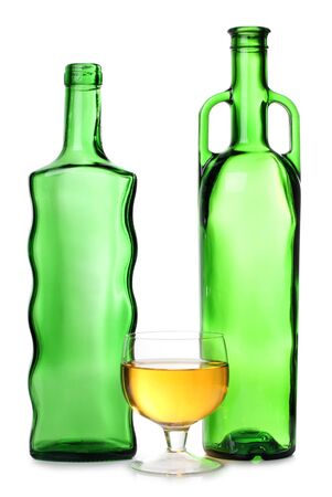 Color photograph of cocktails in glass beakers and bottleの写真素材