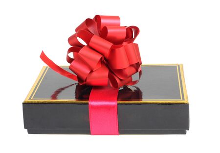 Color photo of a black box and ribbonの写真素材