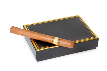 Color photo of an expensive cigar and black boxの写真素材