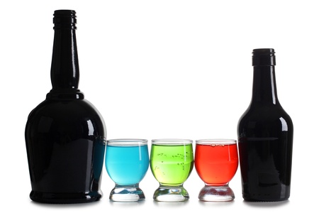 Color photograph of cocktails in glass beakers and bottleの写真素材