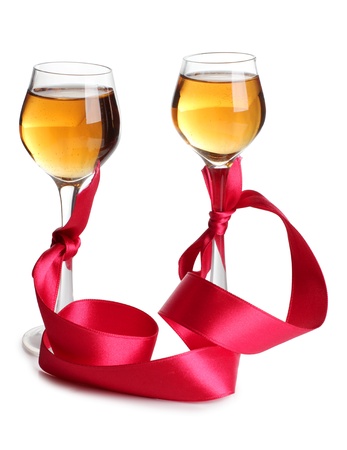Color photo of wine glasses and a red ribbonの写真素材