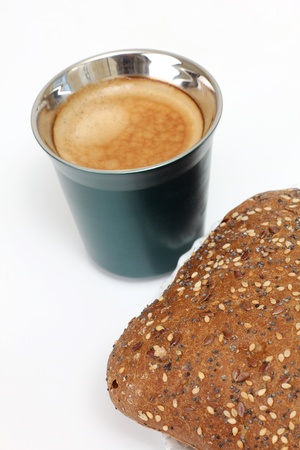 a cup of coffee and snackの写真素材