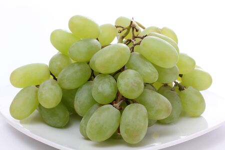 Color photo of grapes called a white plateの写真素材