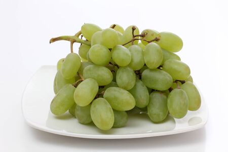 Color photo of grapes called a white plateの写真素材