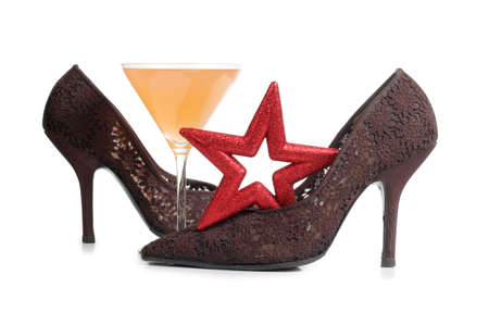 Color photo of female shoes and martini glassの写真素材