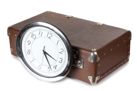 Color photo of an old suitcase and hoursの写真素材