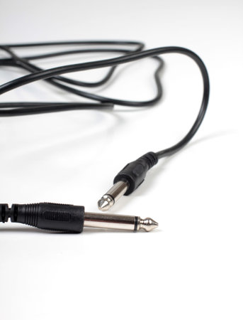 Color photo of an electrical cord with plug