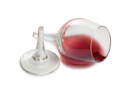 Broken glass and spilled red wineの写真素材