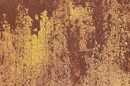 Rusty iron wall covered with paintの写真素材