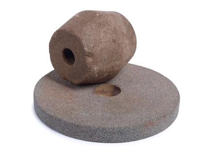 Stone for sharpening knives on a white backgroundの写真素材